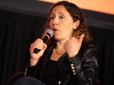 Woman talking into microphone